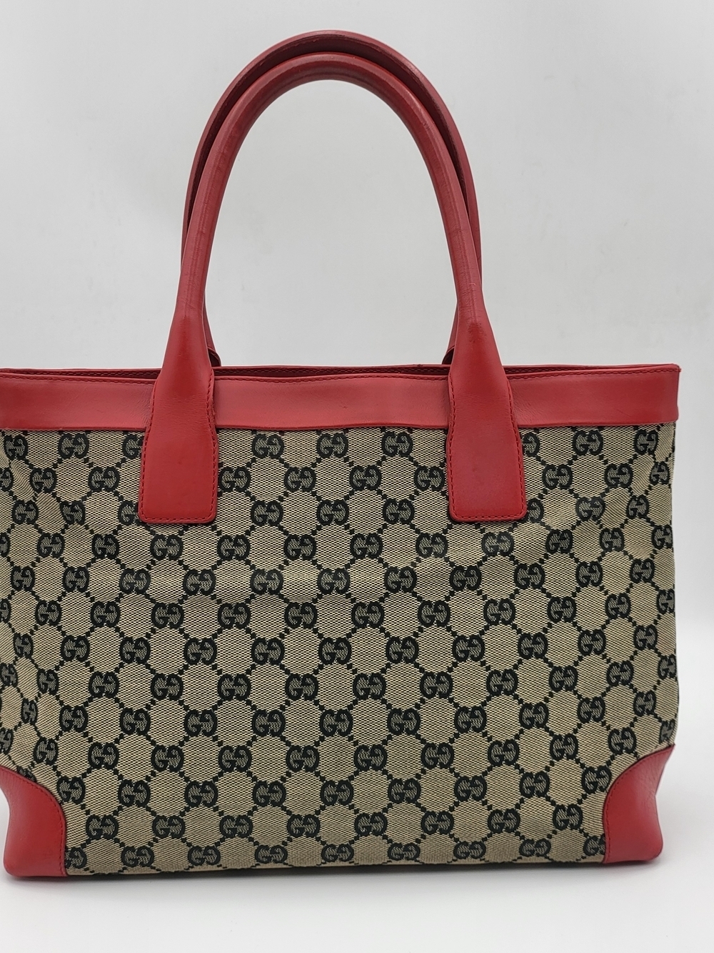 Gucci Supreme GG Canvas Hibiscus Red Leather Handbag, Authentic w/COA.